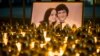 SLOVAKIA -- Light tributes placed during a silent protest in memory of murdered journalist Jan Kuciak and his girlfriend Martina Kusnirova, seen in photo, in Bratislava, Slovakia, on Wednesday, Feb. 28, 2018. 
