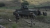 Soldați ucraineni din Brigada a 3-a de asalt separat participă la exerciții militare în apropiere de orașul Bakhmut din regiunea Donețk, Ucraina, la 7 septembrie.