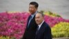 CHINA -- Kazakh President Nursultan Nazarbaev (R) reviews a military honor guard with Chinese President Xi Jinping during a welcome ceremony outside the Great Hall of the People in Beijing, June 7, 2018