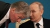Казахстан - Владимир Путин, претседател на Русија (десно) и Дмитриј Песков, портпарол на Кремљ(лево), 27 ноември 2024 година.