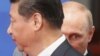 Қытай президенті Си Цзиньпин (алдыңғы қатарда) мен Ресей президенті Владимир Путин. Шанхай, 21 мамыр 2014 жыл