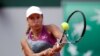 France-Kazakhstan's Yulia Putintseva eyes the ball as she returns the ball to Czech Republic's Barbora Strycova during their women's singles fourth round match on day eight of The Roland Garros 2018 French Open tennis tournament in Paris on June 3, 2018. 
