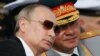 Президент России Владимир Путин и министр обороны Сергей Шойгу