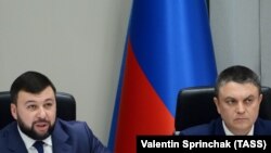 ფოტო არქივიდან: დონეცკის და ლუგანსკის ე.წ. სახალხო რესპუბლიკების "მეთაურები" დენის პუშილინი (მარცხნივ) და ლეონიდ პასეჩნიკი