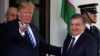 U.S. -- U.S. President Donald Trump greets Uzbek President Shavkat Mirziyoev at the White House in Washington, May 16, 2018