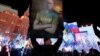 Қырым аннексиясының 4 жылдығындағы Путин бейнесі салынған плакат. Мәскеу. 18 наурыз, 2018 жыл.