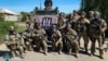 Ofițeri speciali ai centrului de operațiuni speciale "A" al SBU în orașul Kupiansk, regiunea Harkov, eliberat de sub ocupația Rusiei. Fotografie publicată la 10 septembrie 2022