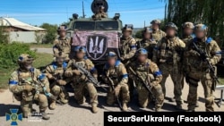 Ofițeri speciali ai centrului de operațiuni speciale "A" al SBU în orașul Kupiansk, regiunea Harkov, eliberat de sub ocupația Rusiei. Fotografie publicată la 10 septembrie 2022