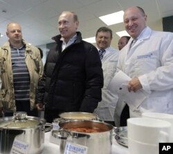 ვლადიმირ პუტინი და ევგენი პრიგოჟინი