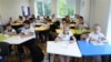 Moldova, Pupils at Vasile Alecsandri High School in Ungheni receive packed lunches or meals delivered by a catering service