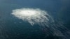 O scurgere de gaz în conducta Nord Stream 2 este văzută dintr-un avion danez F-16. Septembrie 2022.