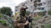 Акопы ў жылым раёне на тэрыторыі, падкантрольнай так званай «ЛНР». Ілюстрацыйнае фота