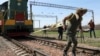 АҚШ-тың Иран келісімінен шығуына қарсылық танытқан ирандық белсенділер Трамптың суретін өртеді. Иран, 9 мамыр 2018 жыл.