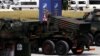 Poland -- Polish soldier prepares a military exhibition in front of the venue of the NATO Summit, which will start in two days, in Warsaw, July 6, 2016