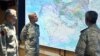 Iranian Army commander-in-chief Amir Hatami (center) attends a meeting in the military's War Command Room at an undisclosed location in Iran.